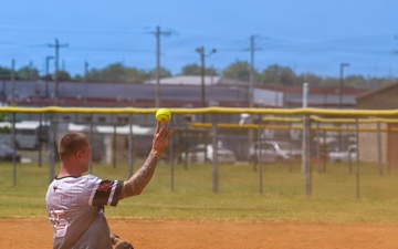 U.S. Army soldiers play softball during Week of the Eagle