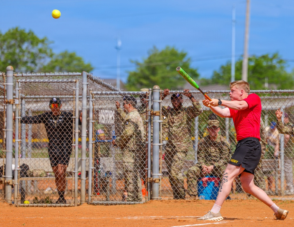 U.S. Army soldiers play softball during Week of the Eagles