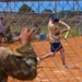 U.S. Army soldiers play softball during Week of the Eagles