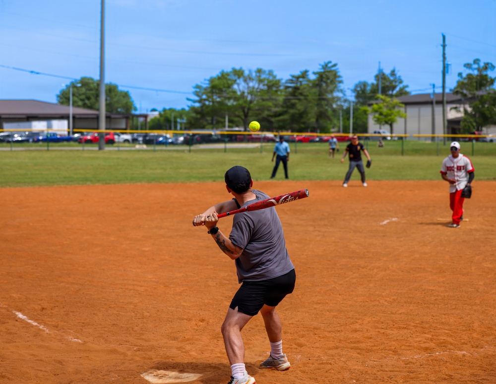 U.S. Army soldiers play softball during Week of the Eagles