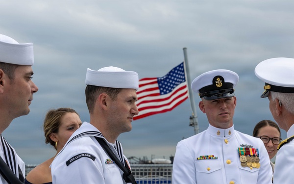 Adm. Thomas Reenlists Sailors Aboard USS Cleveland (LCS 31)