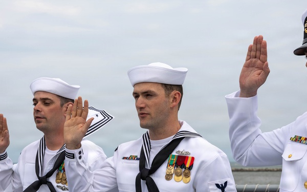 Adm. Thomas Reenlists Sailors Aboard USS Cleveland (LCS 31)