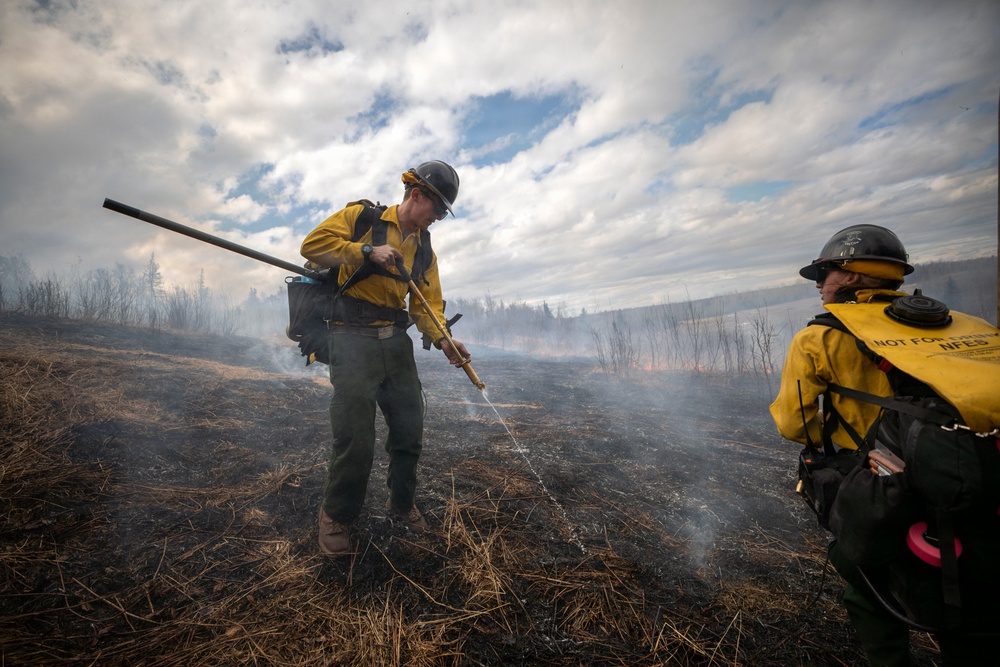 Alaska Air National Guard, Air Force, and State of Alaska Division of Forestry and Fire Protection firefighters team up during controlled burns