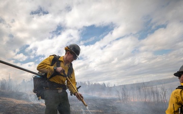 Alaska Air National Guard, Air Force, and State of Alaska Division of Forestry and Fire Protection firefighters team up during controlled burns