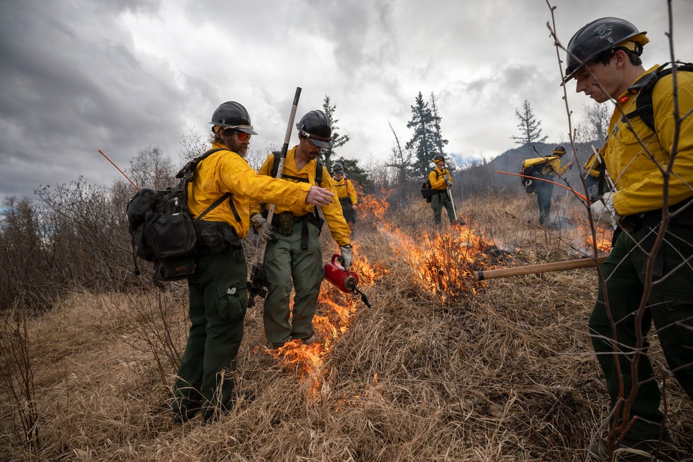 Alaska Air National Guard, Air Force, and State of Alaska Division of Forestry and Fire Protection firefighters team up during controlled burns