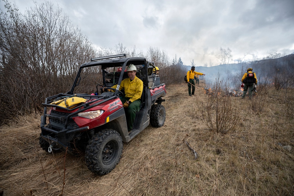 Alaska Air National Guard, Air Force, and State of Alaska Division of Forestry and Fire Protection firefighters team up during controlled burns