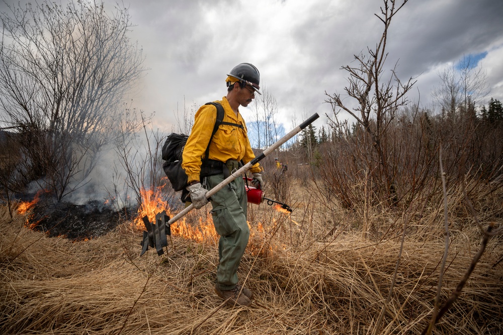 Alaska Air National Guard, Air Force, and State of Alaska Division of Forestry and Fire Protection firefighters team up during controlled burns