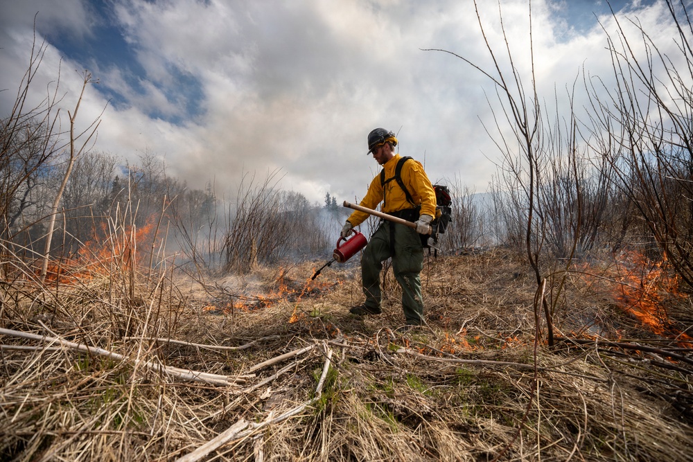 Alaska Air National Guard, Air Force, and State of Alaska Division of Forestry and Fire Protection firefighters team up during controlled burns