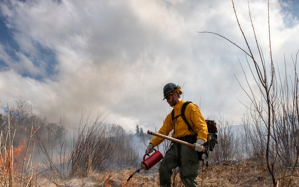 Alaska Air National Guard, Air Force, and State of Alaska Division of Forestry and Fire Protection firefighters team up during controlled burns