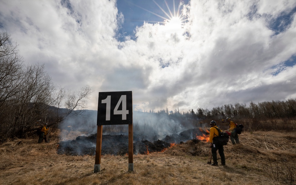 Alaska Air National Guard, Air Force, and State of Alaska Division of Forestry and Fire Protection firefighters team up during controlled burns