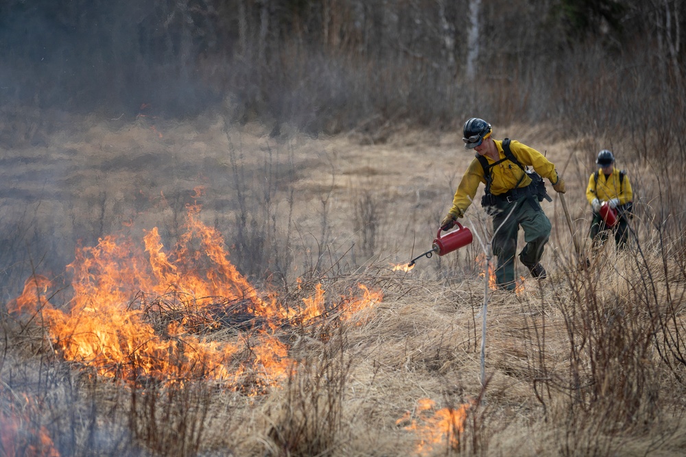 Alaska Air National Guard, Air Force, and State of Alaska Division of Forestry and Fire Protection firefighters team up during controlled burns