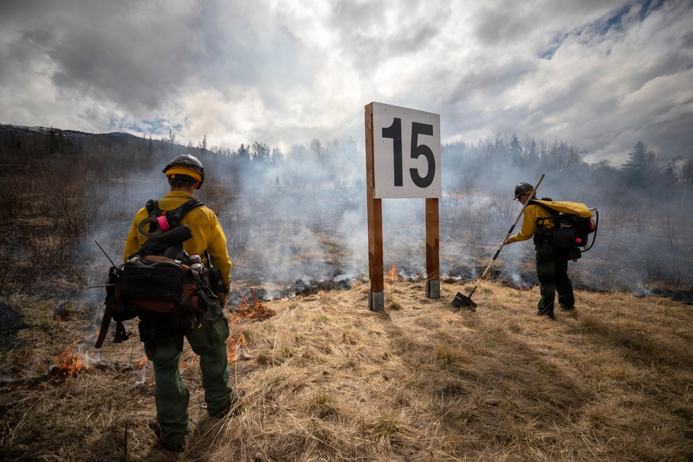 Alaska Air National Guard, Air Force, and State of Alaska Division of Forestry and Fire Protection firefighters team up during controlled burns