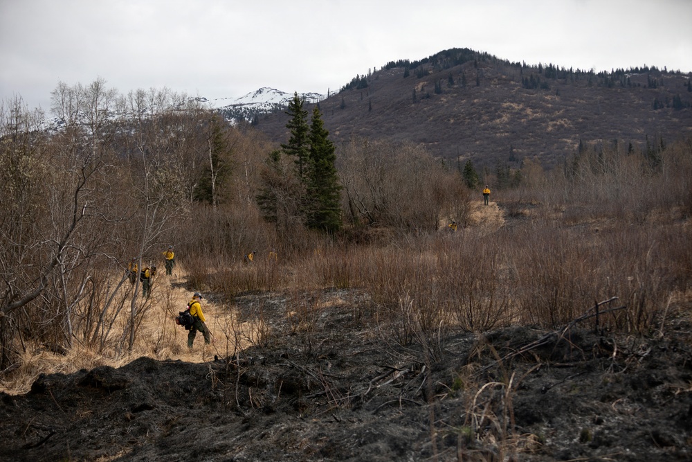 Alaska Air National Guard, Air Force, and State of Alaska Division of Forestry and Fire Protection firefighters team up during controlled burns