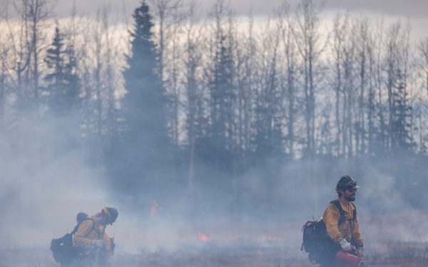 Alaska Air National Guard, Air Force, and State of Alaska Division of Forestry and Fire Protection firefighters team up during controlled burns
