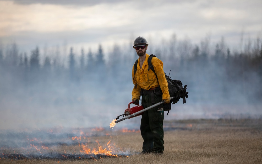 Alaska Air National Guard, Air Force, and State of Alaska Division of Forestry and Fire Protection firefighters team up during controlled burns