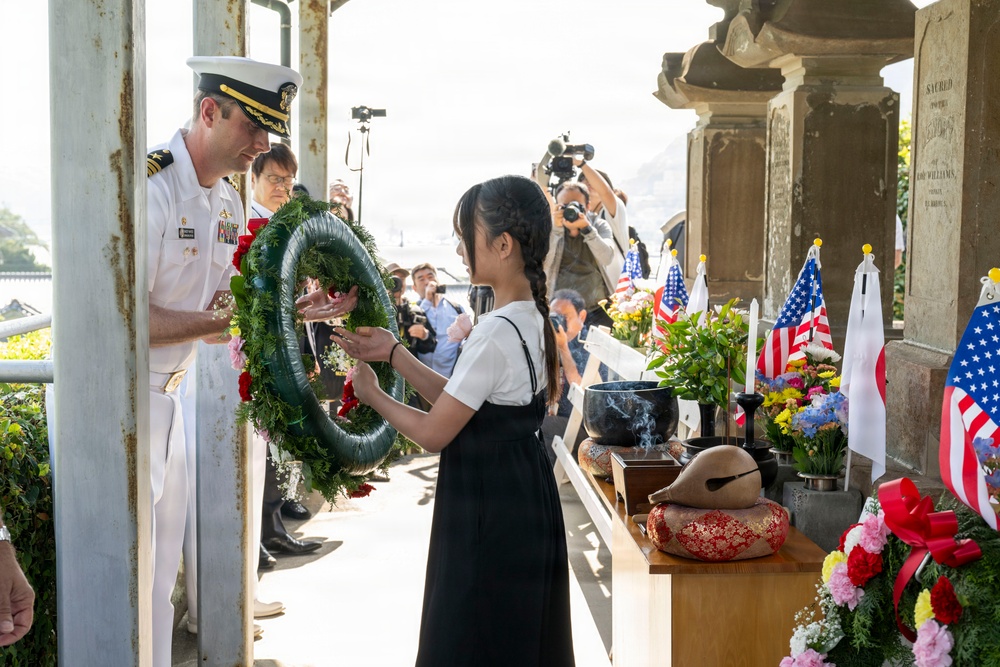 U.S. Navy commanding officers participate in a memorial service for Americans interred at Gyokusenji Temple in Shimoda, Japan during 87th annual Black Ship Festival