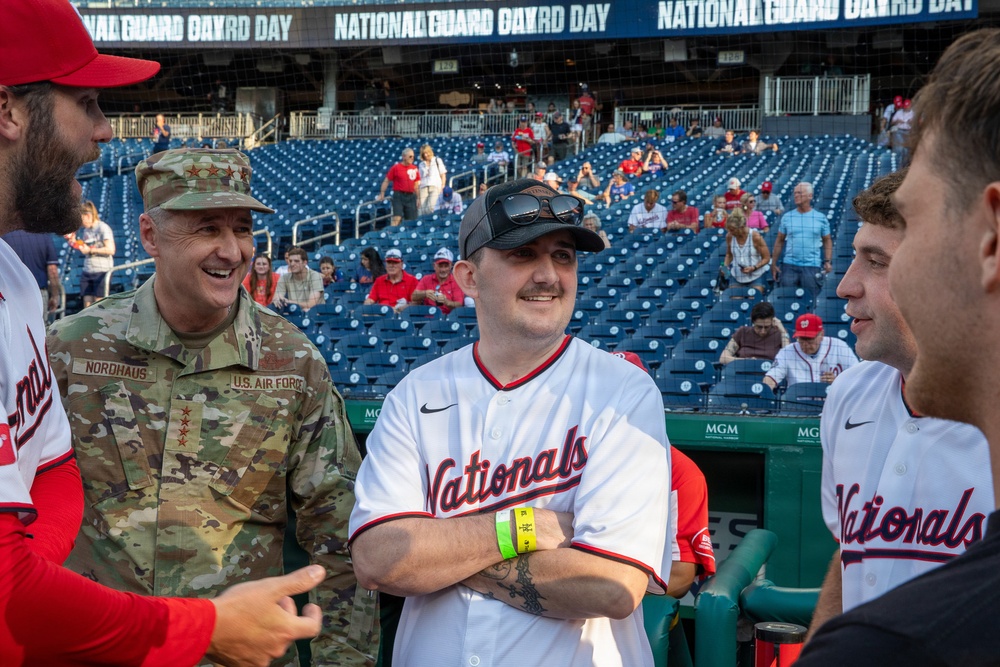 Staff Sgt. Andrew Wolfe Throws First Pitch at Washington Nationals National Guard Appreciation Game
