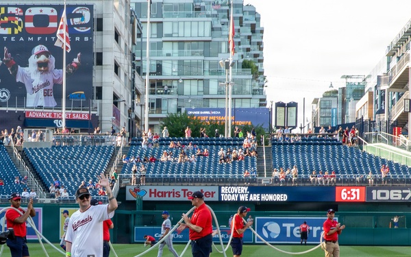 Staff Sgt. Andrew Wolfe Throws First Pitch at Washington Nationals National Guard Appreciation Game