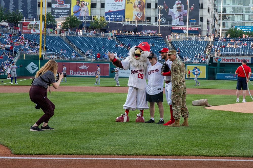 Staff Sgt. Andrew Wolfe Throws First Pitch at Washington Nationals National Guard Appreciation Game