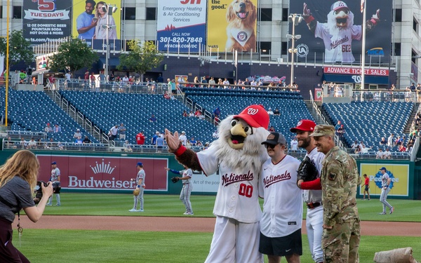 Staff Sgt. Andrew Wolfe Throws First Pitch at Washington Nationals National Guard Appreciation Game