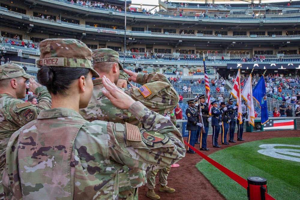 Staff Sgt. Andrew Wolfe Throws First Pitch at Washington Nationals National Guard Appreciation Game