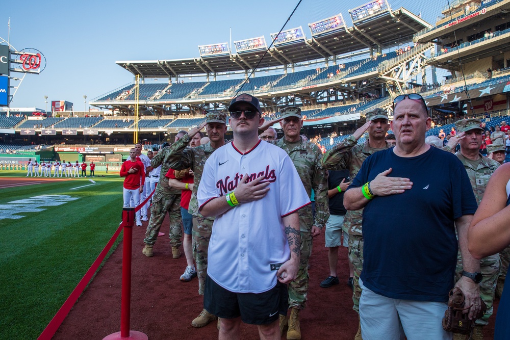 Staff Sgt. Andrew Wolfe Throws First Pitch at Washington Nationals National Guard Appreciation Game