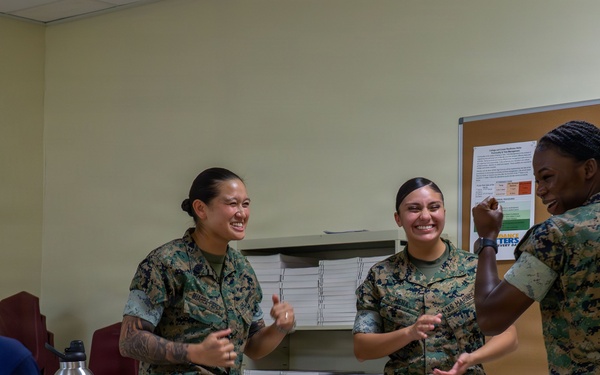 Camp Blaz Marines conduct poolee talks at Okkodo High School