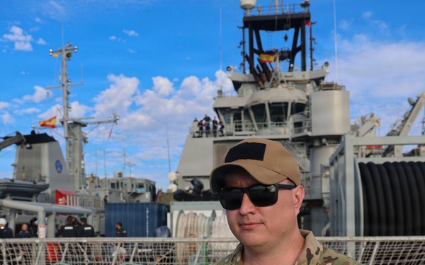 MN1 Merrick Ziegenbein operates aboard the Spanish Multi-Purpose Ship ESPS Cartagena during ESP MINEX-26
