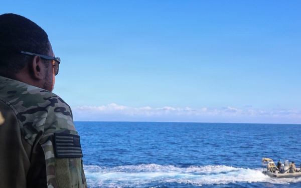OS1 Drew Upchurch observes RHIB maneuvers from the Spanish multi-purpose ship ESPS Cartagena during ESP MINEX-26