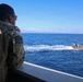 OS1 Drew Upchurch observes RHIB maneuvers from the Spanish multi-purpose ship ESPS Cartagena during ESP MINEX-26
