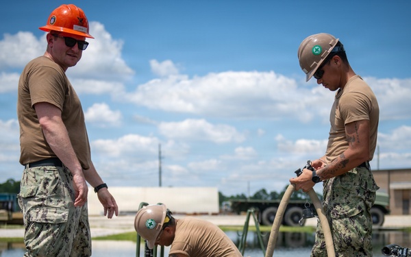 Naval Construction Battalion 14 Completes Training While Supporting Local Community