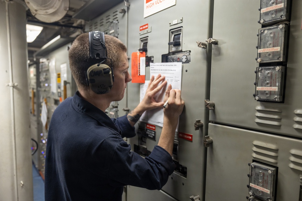 Sailors conduct maintenance aboard USS Donald Cook