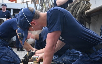 Crew and cadets prepare US Coast Guard Cutter Eagle for paint