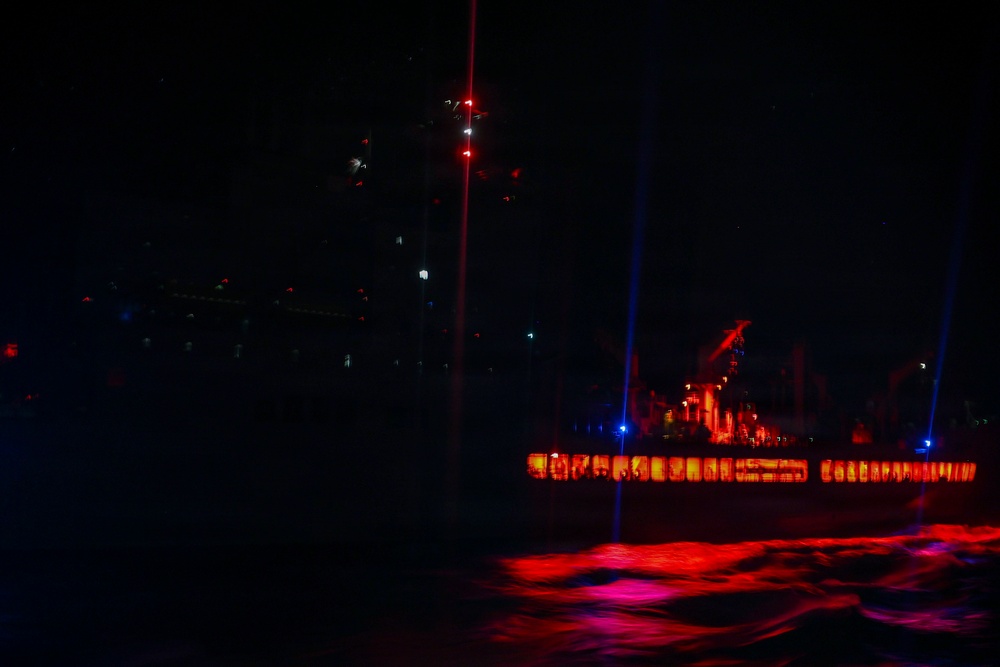 USS Comstock Conducts a Replenishment-At-Sea with USNS John Lewis