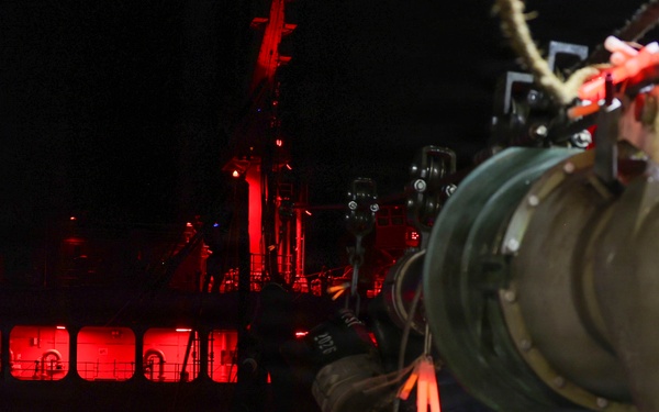 USS Comstock Conducts a Replenishment-At-Sea with USNS John Lewis