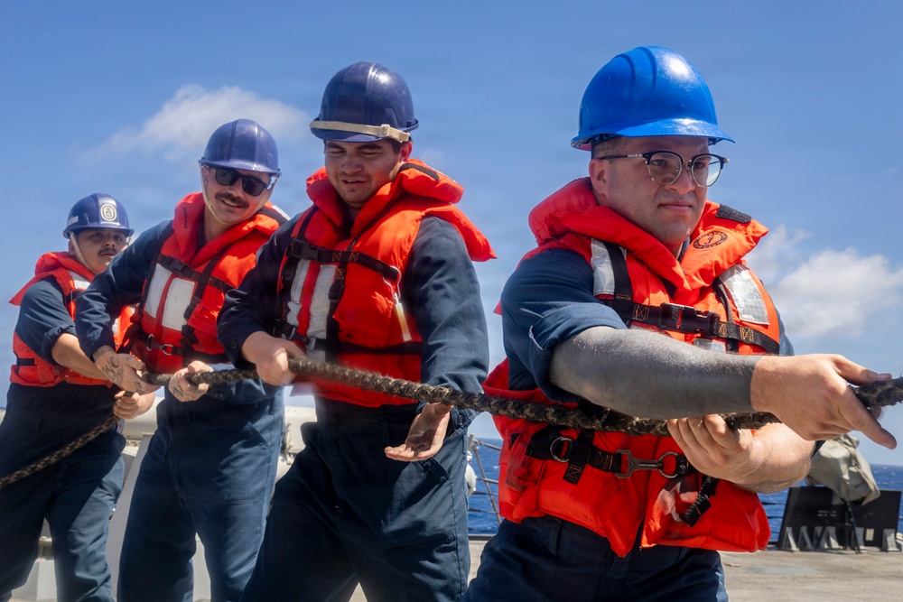 USS Delbert D. Black Conducts a Replenishment-at-Sea