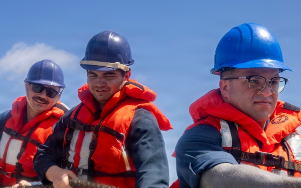 USS Delbert D. Black Conducts a Replenishment-at-Sea