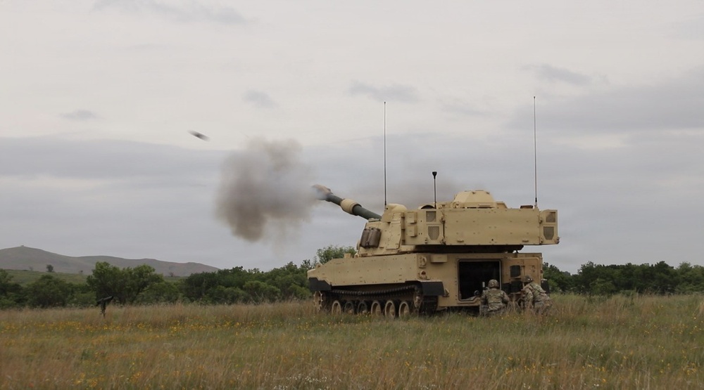 Best Redleg Competitors from 1st Armored Division Artillery shoot live rounds during the Best Redleg Competition