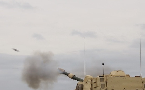 Best Redleg Competitors from 1st Armored Division Artillery shoot live rounds during the Best Redleg Competition
