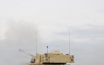Best Redleg Competitors from 1st Armored Division Artillery shoot live rounds during the Best Redleg Competition