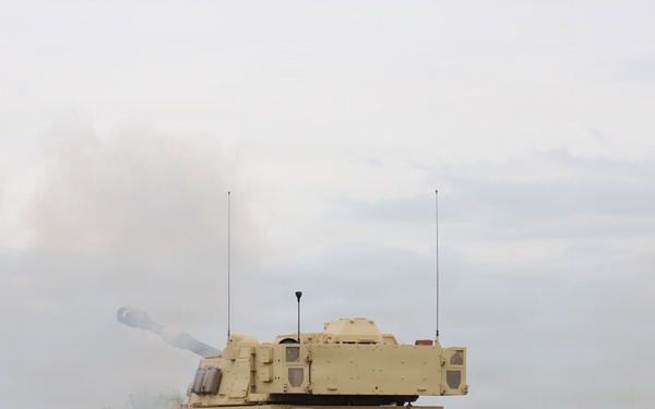 Best Redleg Competitors from 1st Armored Division Artillery shoot live rounds during the Best Redleg Competition