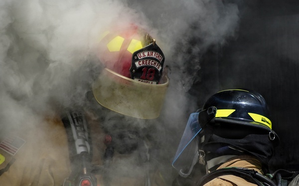 432 Commander and Command Chief obtain live fire training