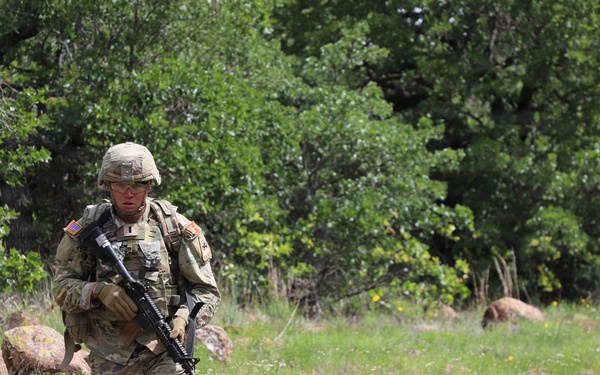 13F Best Redleg Competitors from 1st Armored Division Artillery during the Close Air Support lane at the 2026 Best Redleg Competition