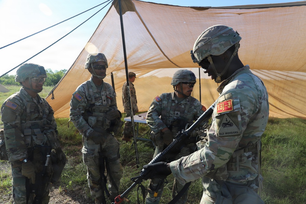 Best Redleg Competitors from 1st Armored Division Artillery rotate through evaluated ESB lanes during the 2026 Best Redleg Competition