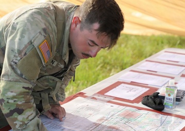 Best Redleg Competitors from 1st Armored Division Artillery rotate through evaluated ESB lanes during the 2026 Best Redleg Competition