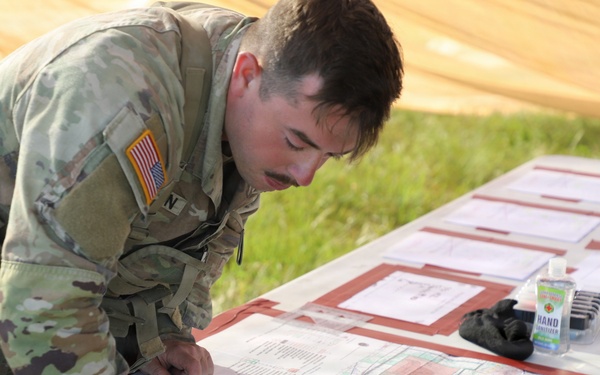 Best Redleg Competitors from 1st Armored Division Artillery rotate through evaluated ESB lanes during the 2026 Best Redleg Competition