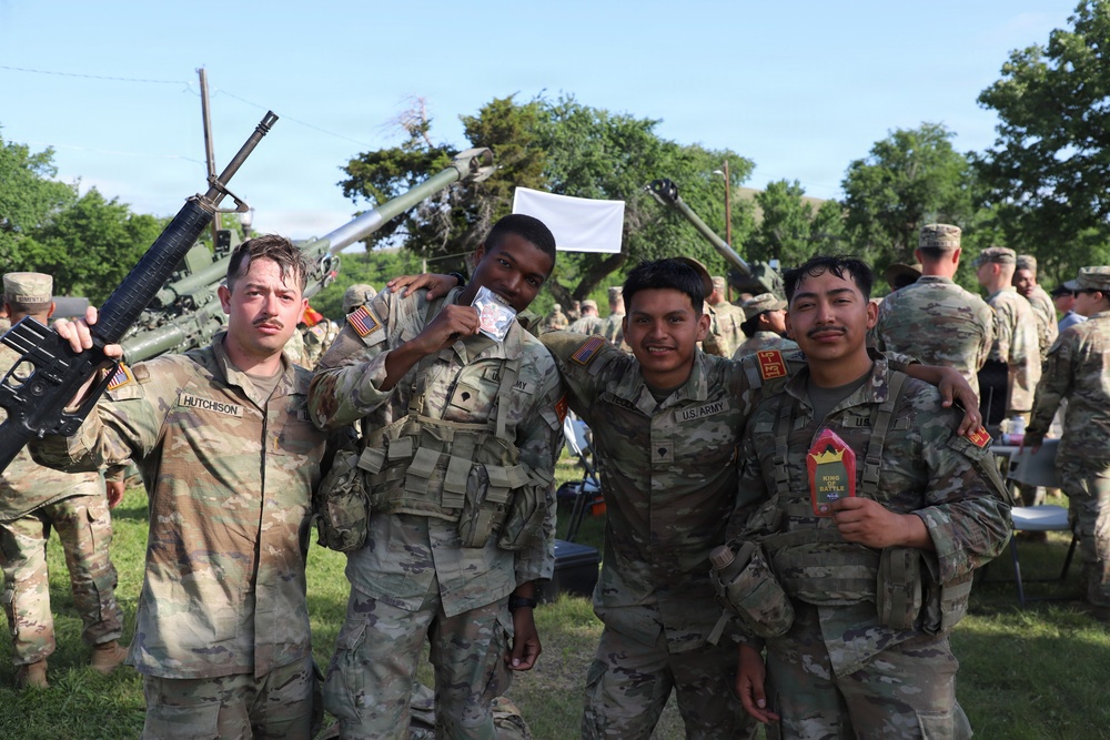 Best Redleg Competitors from 1st Armored Division Artillery complete the 12 mile ruck to conclude the 2026 Best Redleg Competition