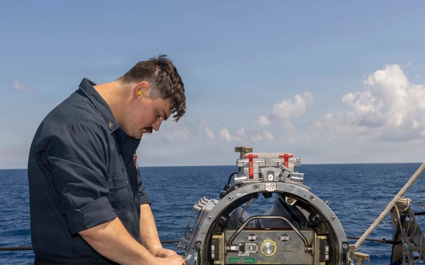 USS Bulkeley Sailor performs maintenance on surface vessel torpedo tube April 21, 2026