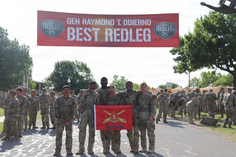 Best Redleg Competitors from 1st Armored Division Artillery complete the 12 mile ruck to conclude the 2026 Best Redleg Competition
