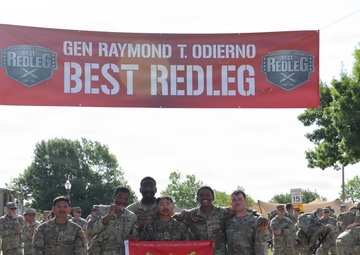Best Redleg Competitors from 1st Armored Division Artillery complete the 12 mile ruck to conclude the 2026 Best Redleg Competition
